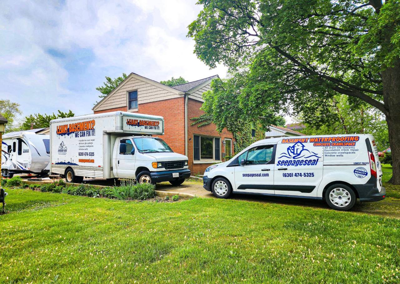 Professional basement waterproofing work in progress